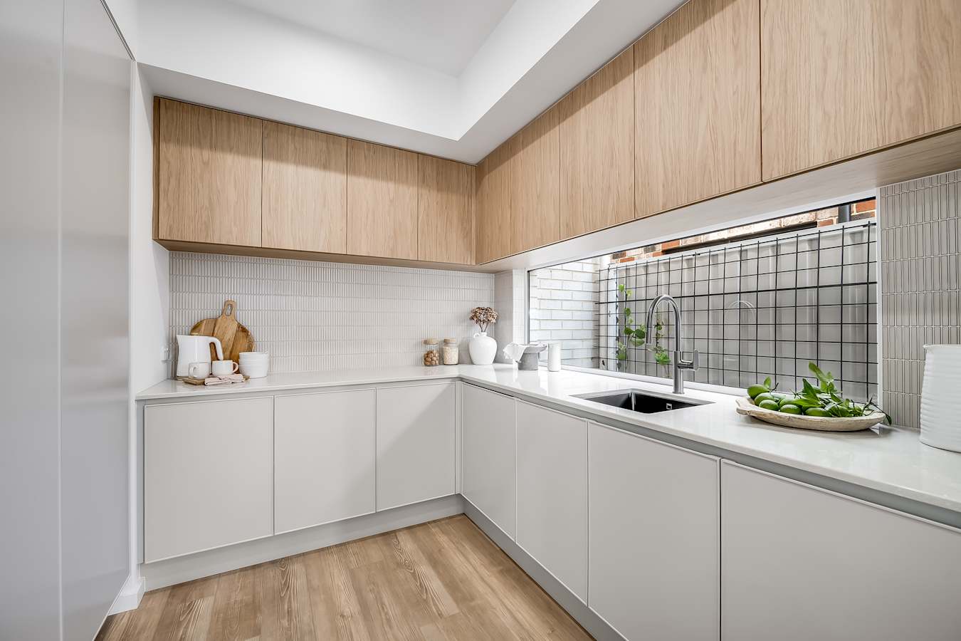 image upload c_limit,f_auto,h_900 v1776906553 home-designs eastwood displays eastwood-37-house-design-butlers-pantry_fobvep