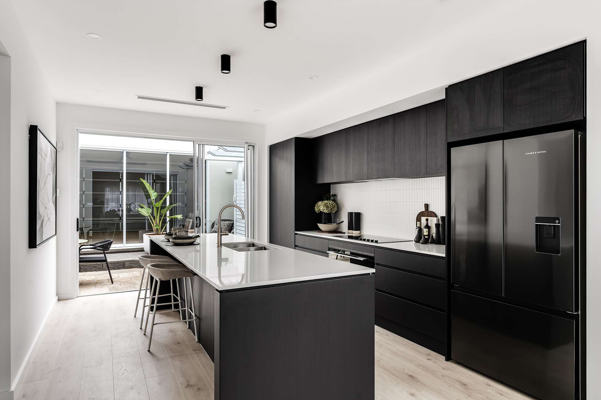 image upload c_limit,f_auto,w_2000 v1776742285 home-designs arno displays arno-house-design-kitchen