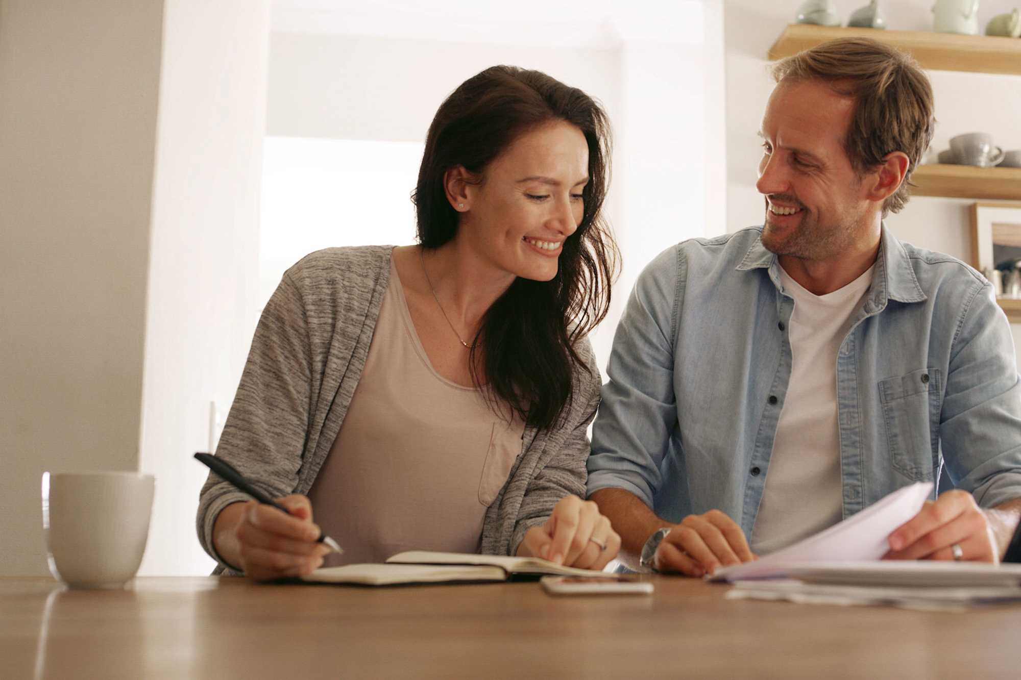 young couple looking at finance